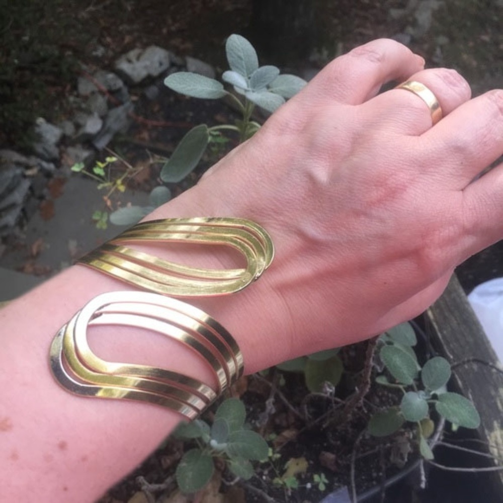 Gold tone metallic cuff bracelet